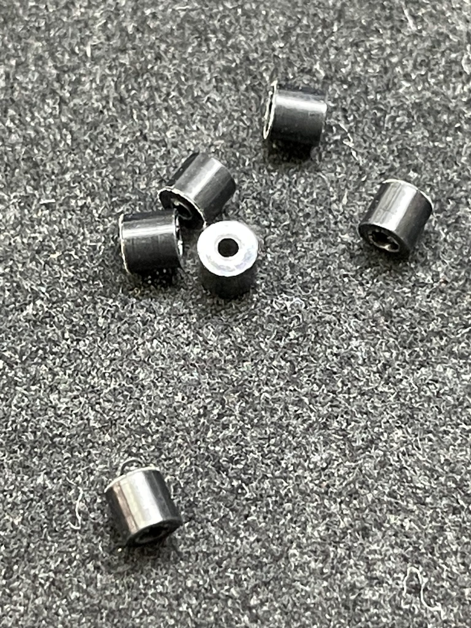 (8) V2 FRONT AXLE RETAINERS, CNC MACHINED OUT OF DELRIN FOR A TIGHT FIT